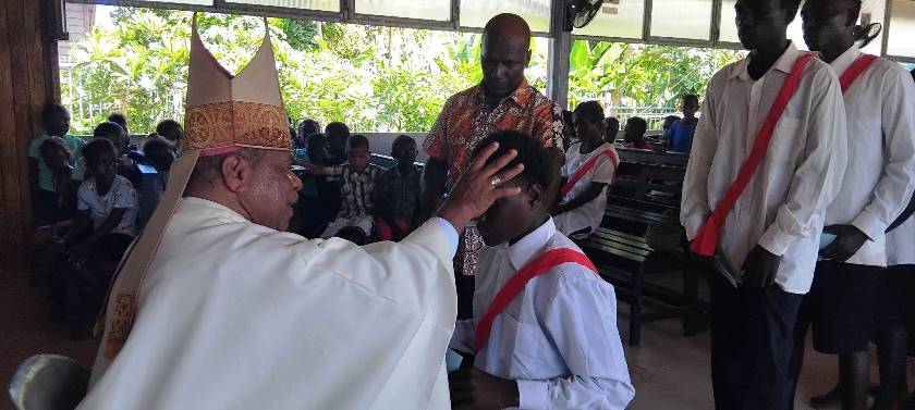 Bishop Peter consecrat a cadidate from taro